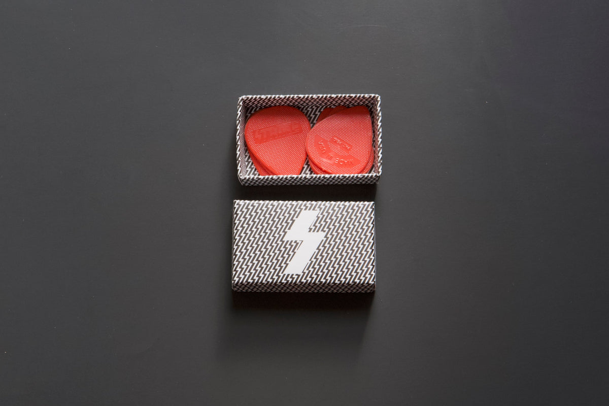 Strike Picks red guitar picks and packaging